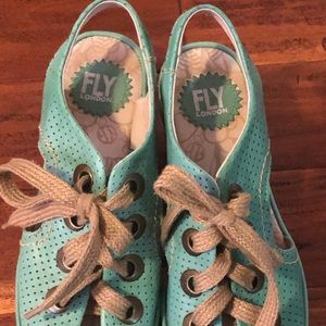 Teal fly London sandals